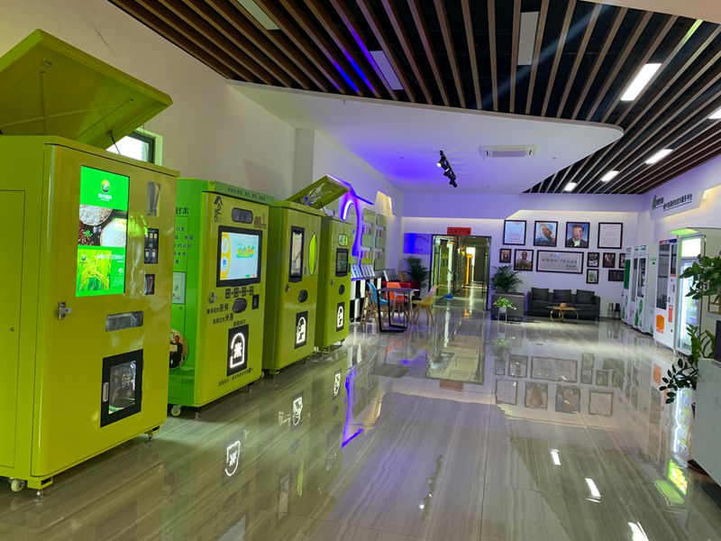 Green vending machines in lobby display